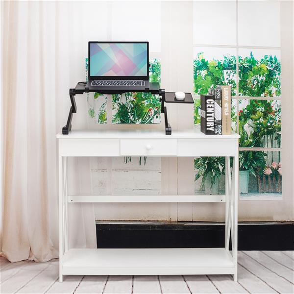 White desk with a laptop on a folding table for laptop