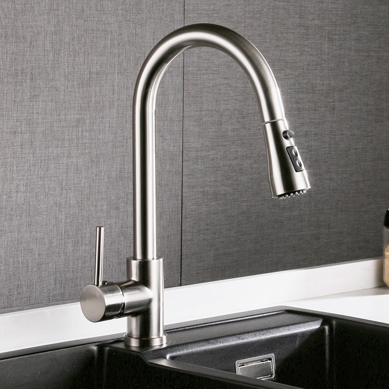 Modern kitchen faucet with a gray wall background
